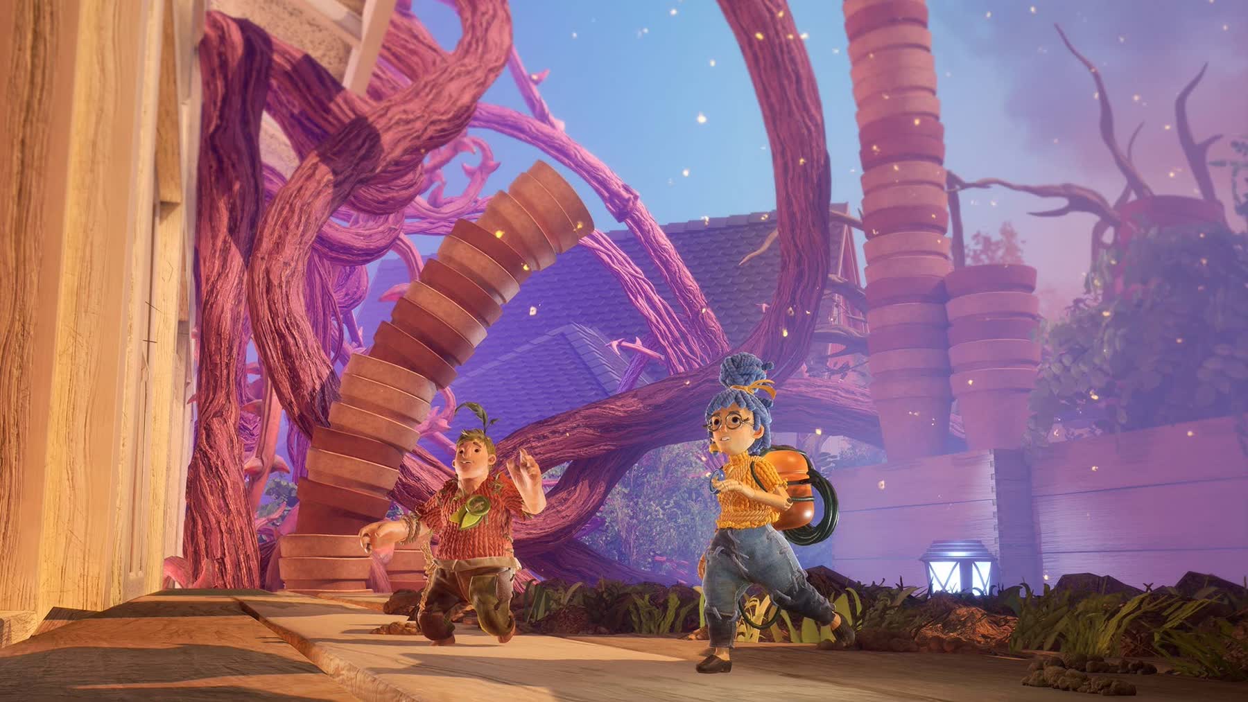 Cody and May explore a garden in It Takes Two