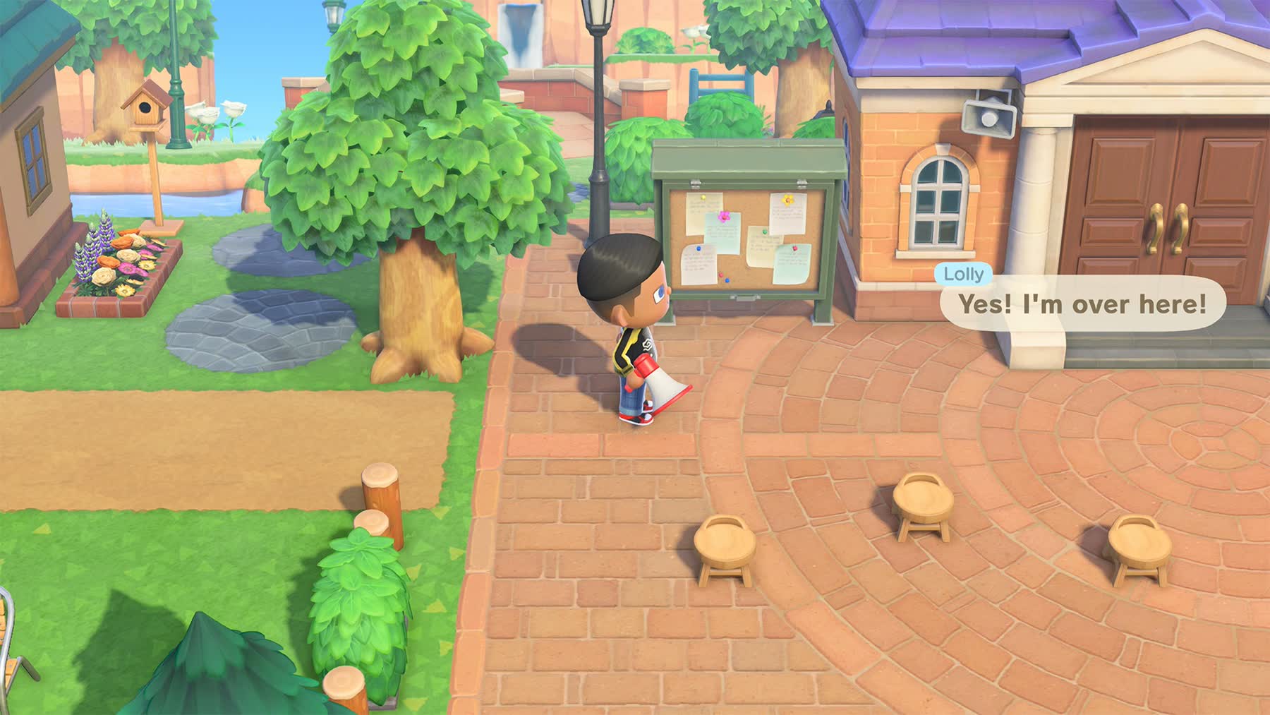A player uses a megaphone to call a resident in Animal Crossing: New Horizons.